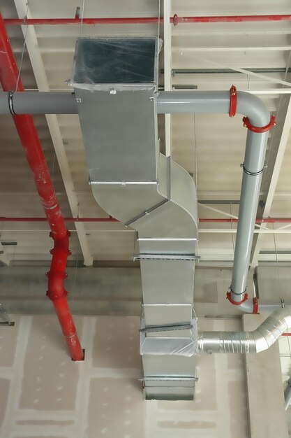 new-installation-steel-air-conditioning-duct-pipes-industrial-building_1048944-11338312