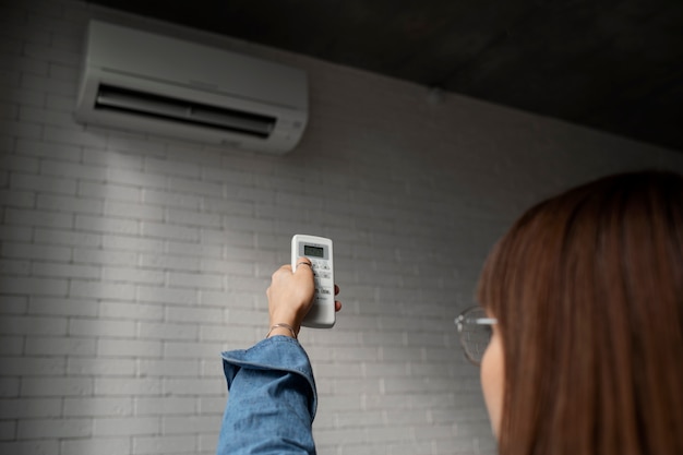 young-woman-using-home-technology_23-2149216632